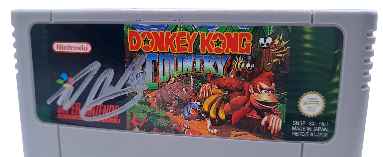 Donkey kong country (Signert av Kevin Bayliss og David Wise) - Super nintendo entertainment system spill (snes)