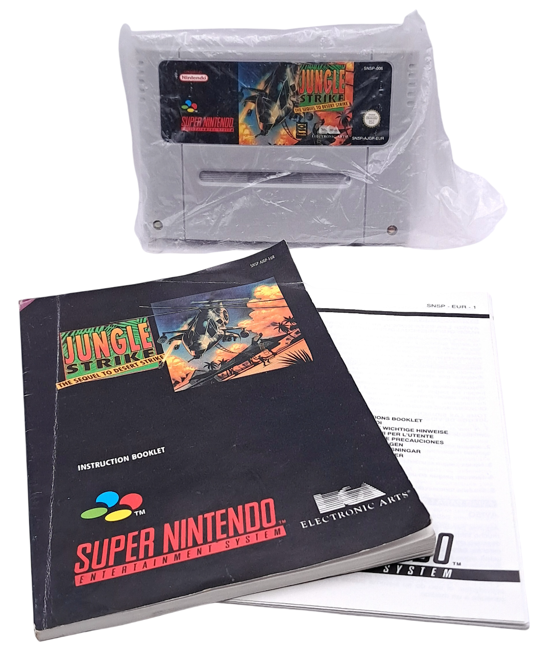 Jungle strike (i eske) - Super nintendo spill (snes)